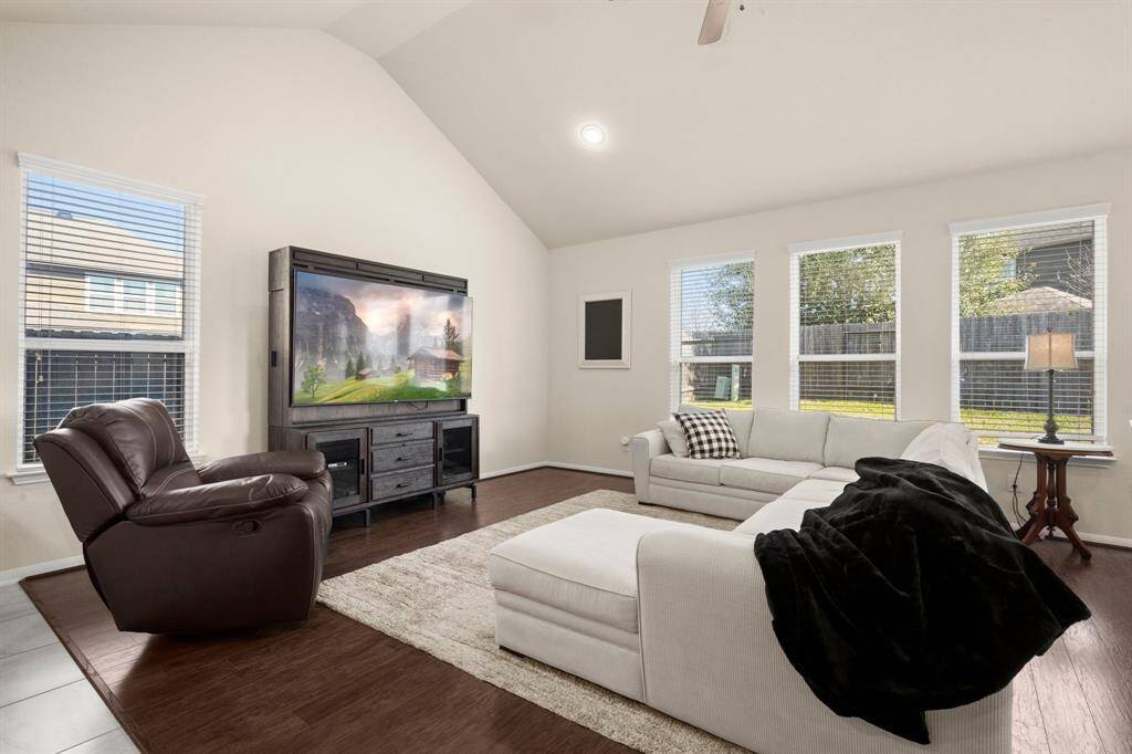 The spacious living room provides lots of space for all your events and activities.  The natural light is amazing!