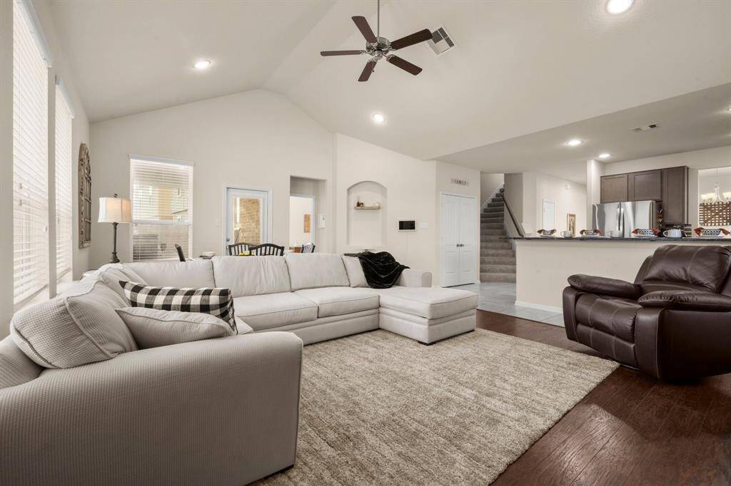 The vaulted ceiling gives the room an wide open light and bright affect.