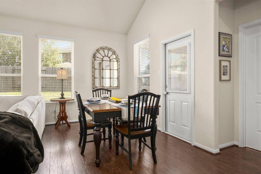 This breakfast room shares space with the living room and has lot of natural light!