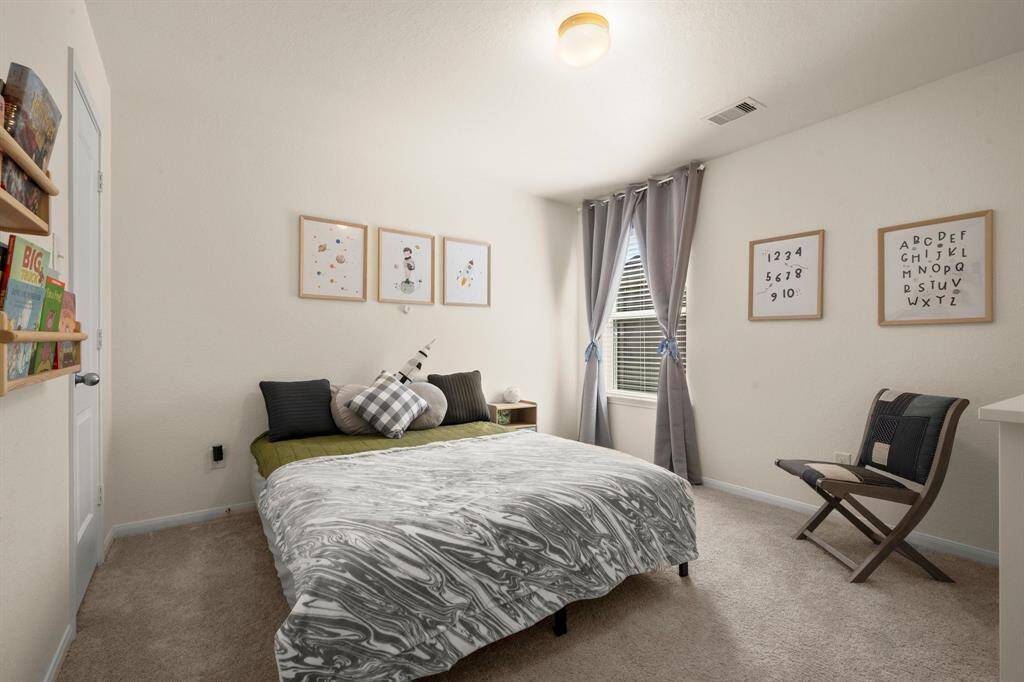 The first bedroom has a walk-in closet and has great natural light.