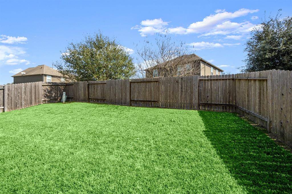The backyard is a blank palette with lots of possibilities. Throwing a ball or having gatherings would be a breeze in this space!