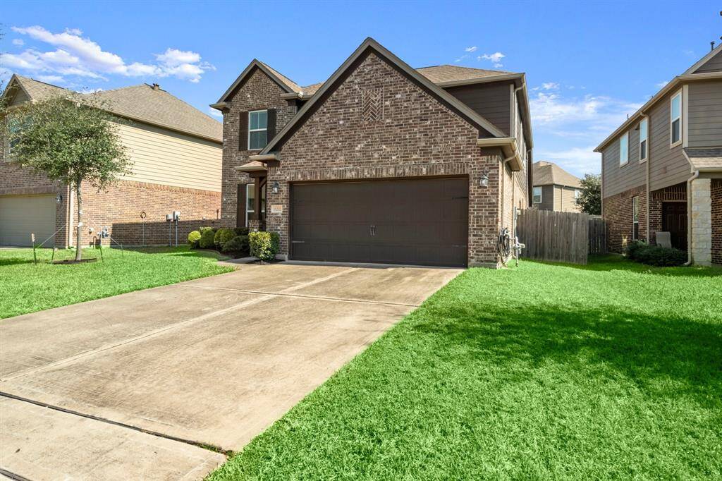 The driveway is double wide and provides room for additional parking for guests.