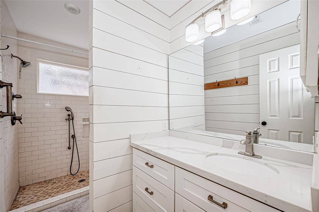 Bath 2 with quartz countertop and oversized shower