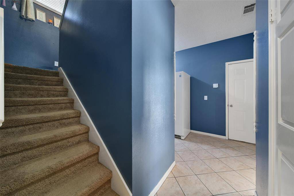 Let's go upstairs, you can use either the back staircase by the laundry room or the main staircase in the foyer.