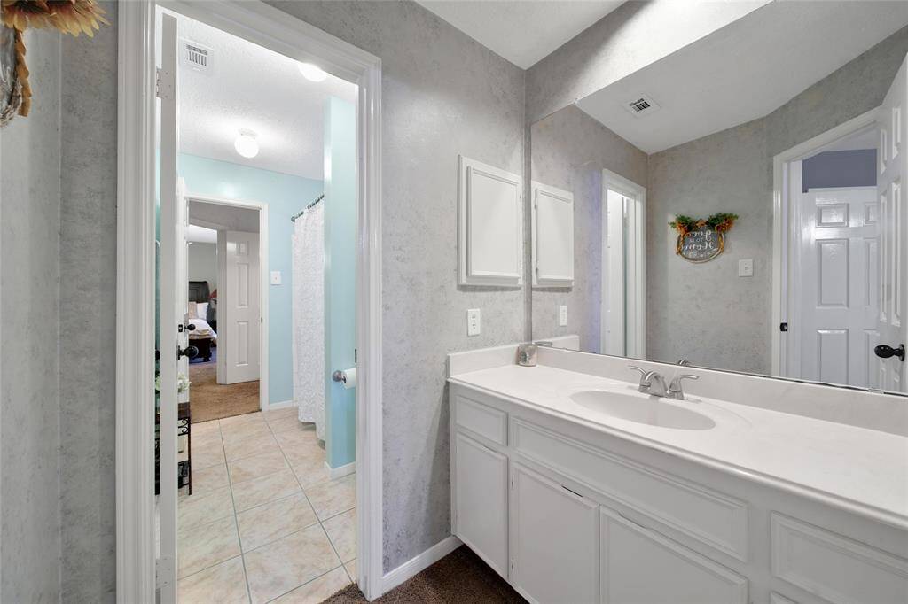 Each bedroom has a private sink area with a Jack n Jill shared bath.
