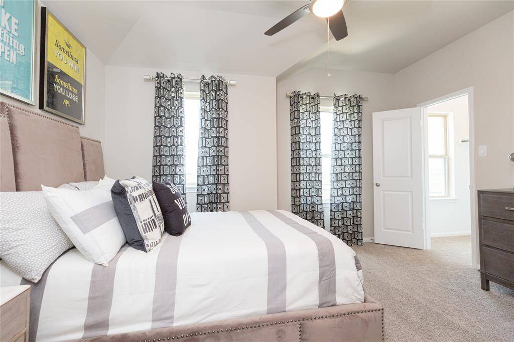 Sample photo of completed home with similar plan. As-built color and selections may vary.