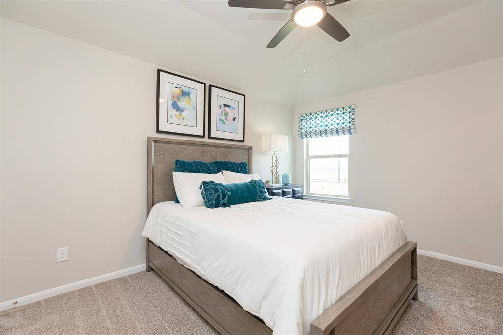 Sample photo of completed home with similar plan. As-built color and selections may vary.