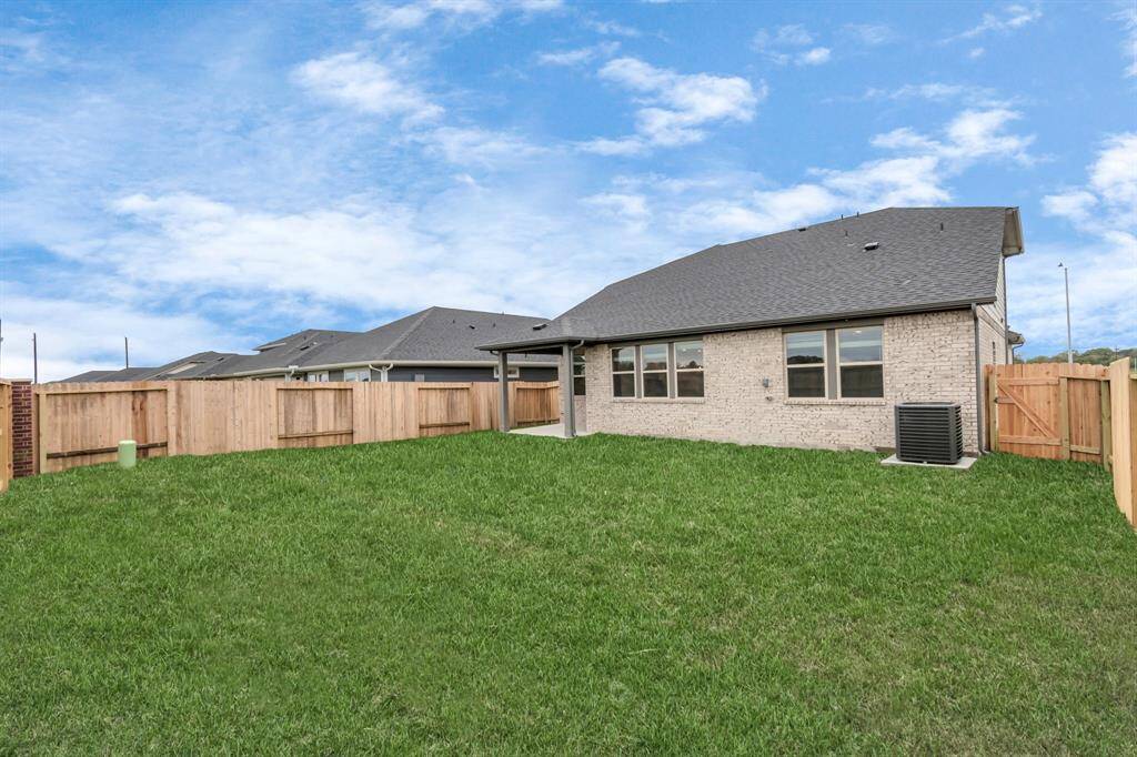 Sample photo of completed home with similar plan. As-built color and selections may vary.