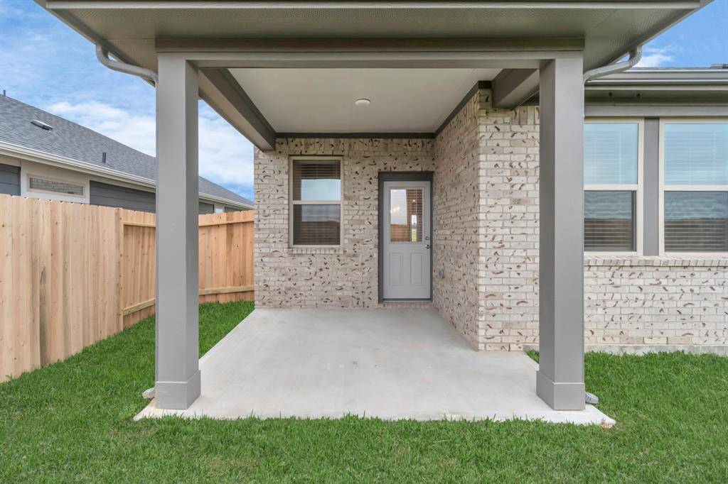 Sample photo of completed home with similar plan. As-built color and selections may vary.
