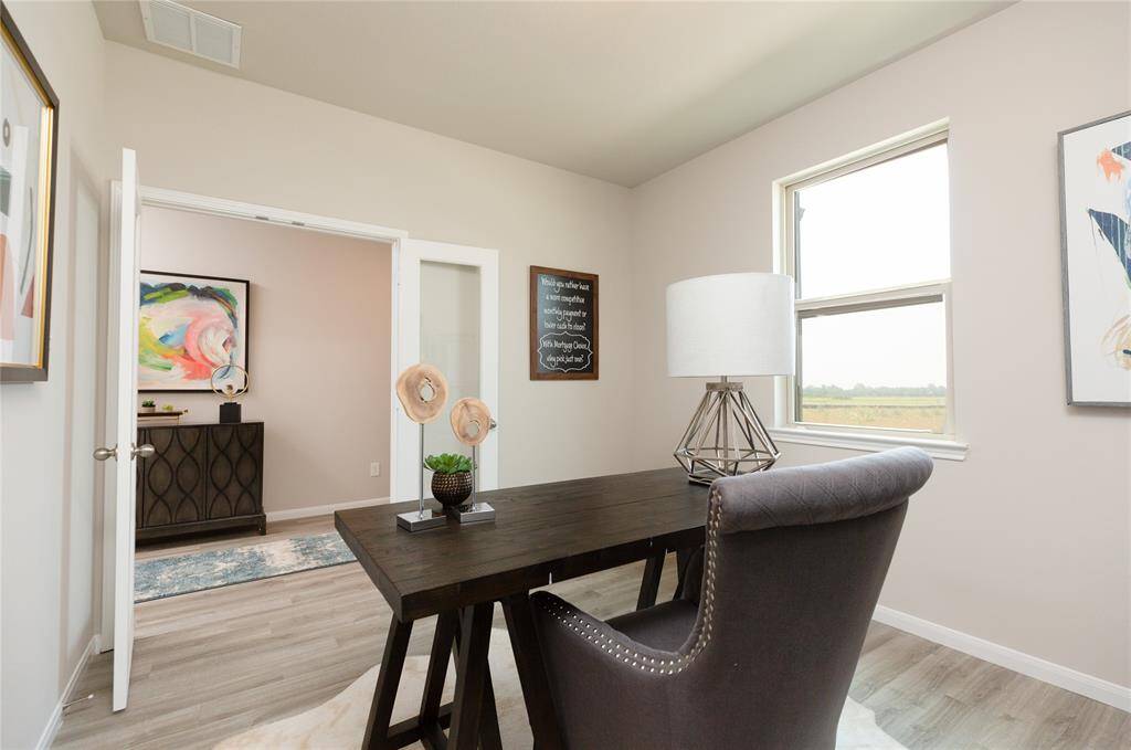 Sample photo of completed home with similar plan. As-built color and selections may vary.