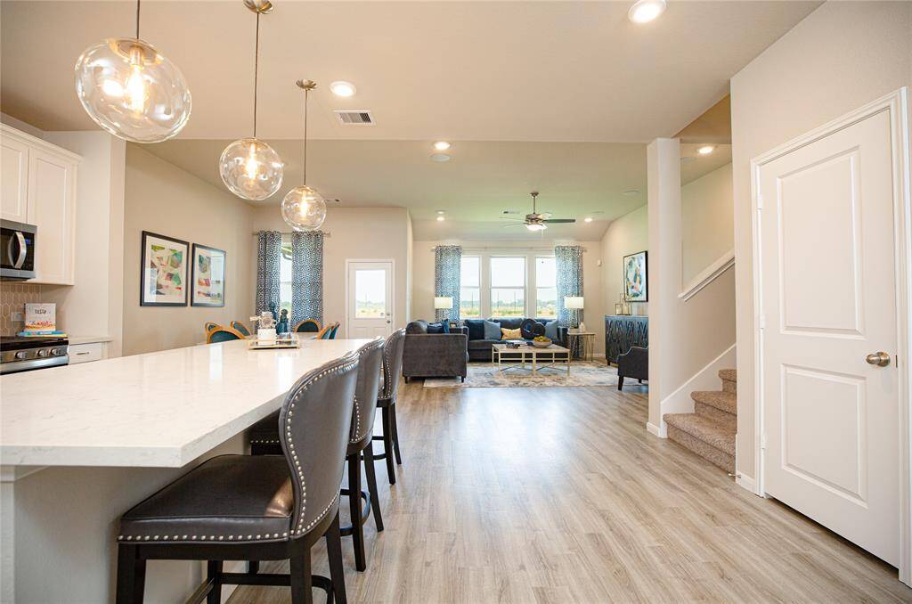 Sample photo of completed home with similar plan. As-built color and selections may vary.