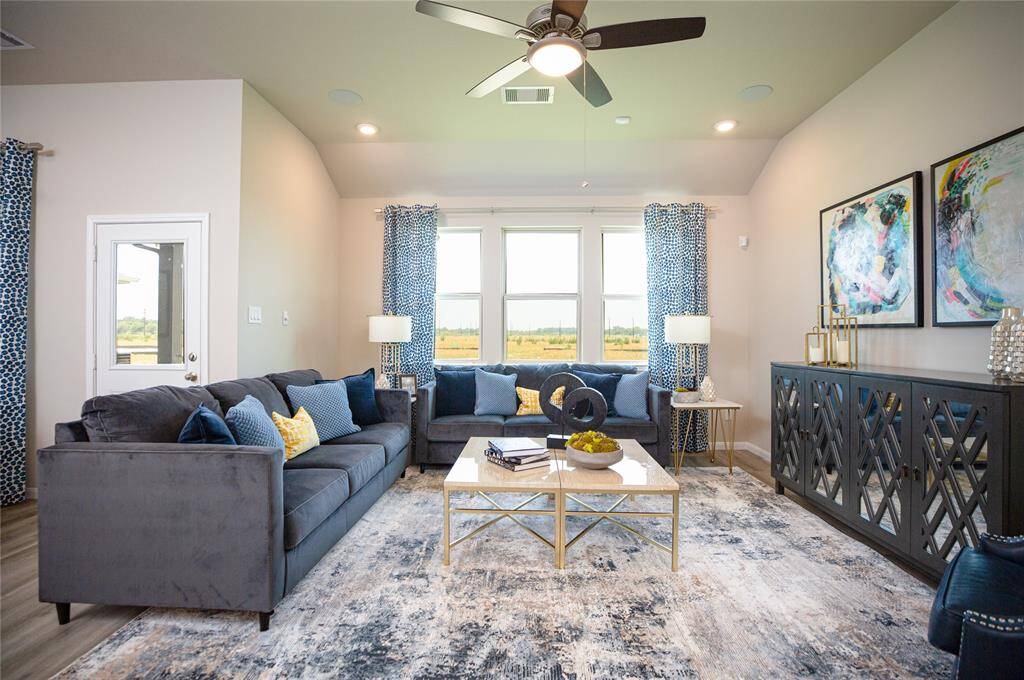 Sample photo of completed home with similar plan. As-built color and selections may vary.