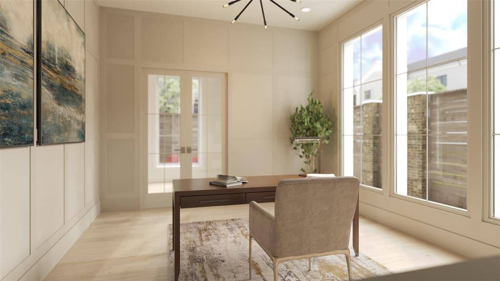 Another view of the study of the with a set of divided lite French doors.