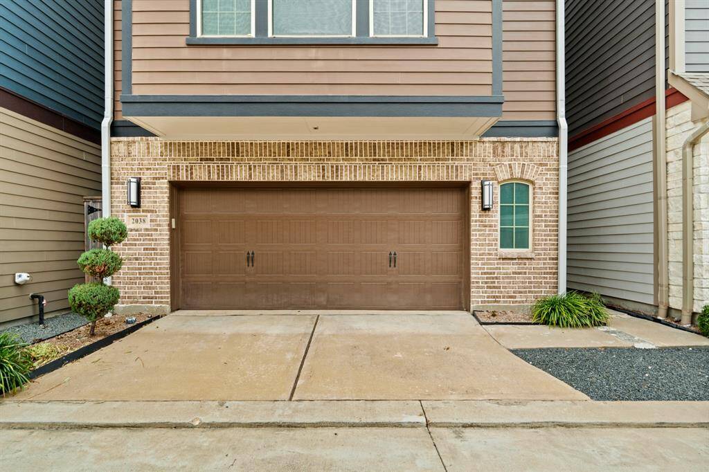 Front door is to the right-side of the house.