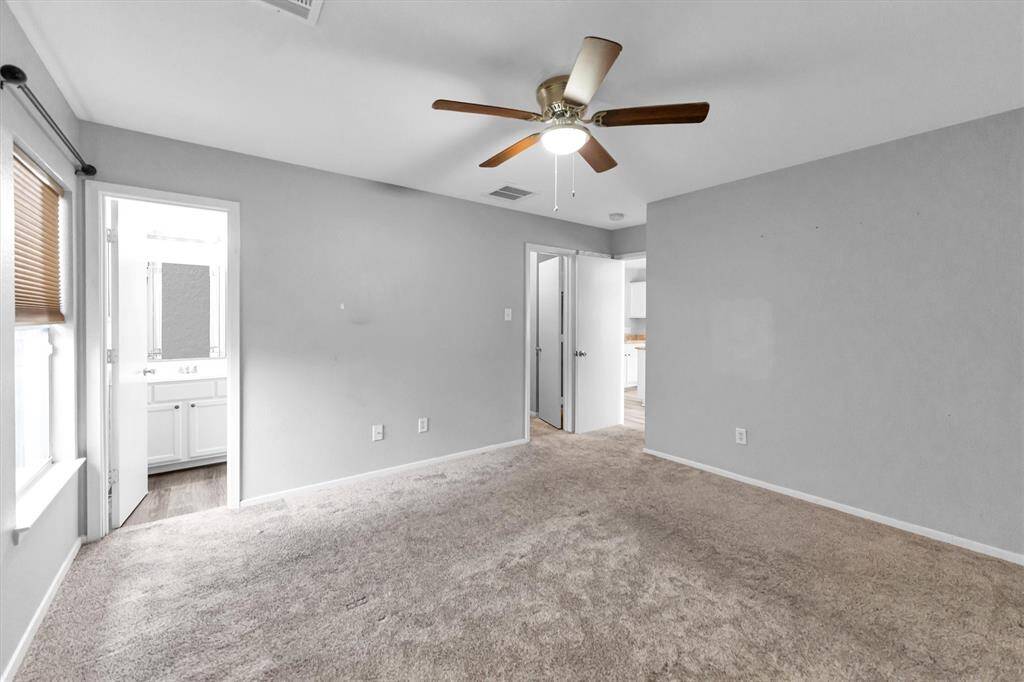 Primary Bedroom with Walk-In Closet and En-Suite Bathroom