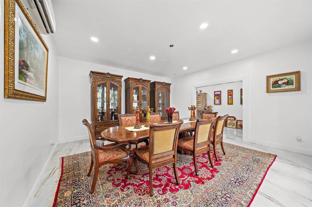 Formal dining room with ample space and elegant surrounding