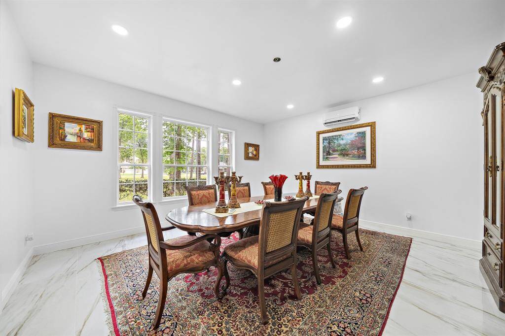 Bright dining room with large windows and ample space