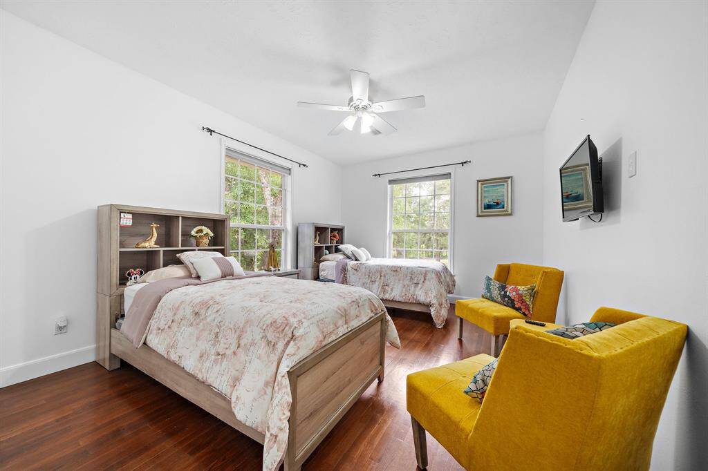 Bedroom with large windows and neutral tones