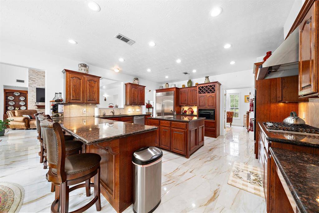 Spacious kitchen with an island and modern appliances