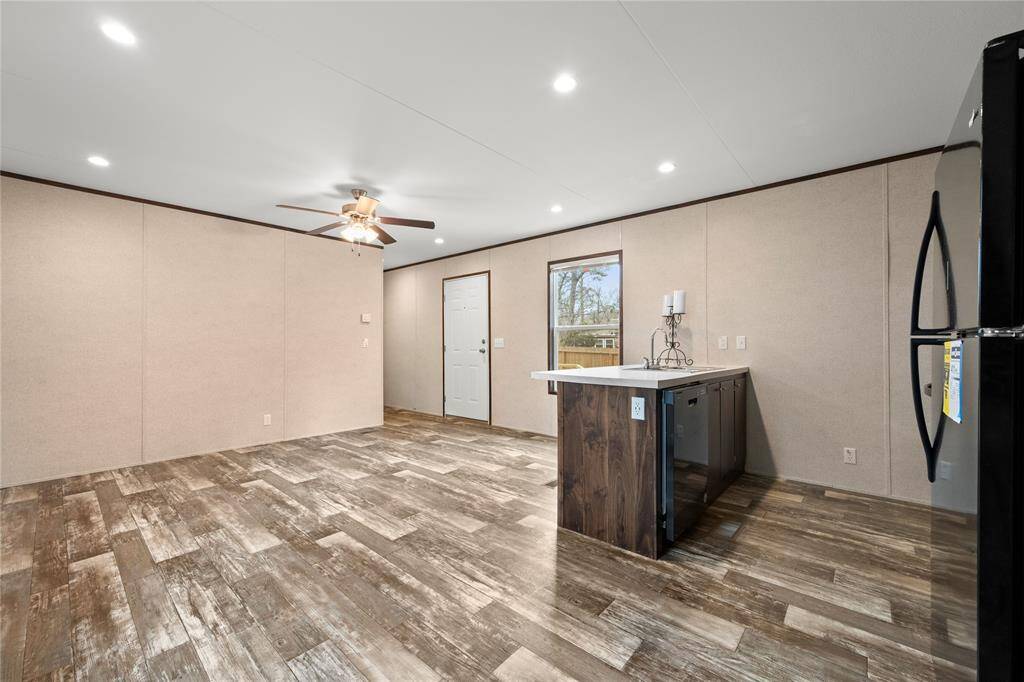 Looking to Front Door and Living Area