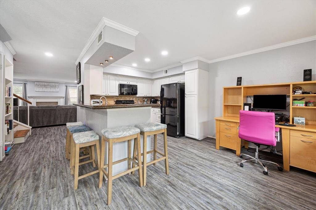 The airy kitchen and dining room will suit all of your culinary and entertaining needs! The breakfast bar seats up to 5.