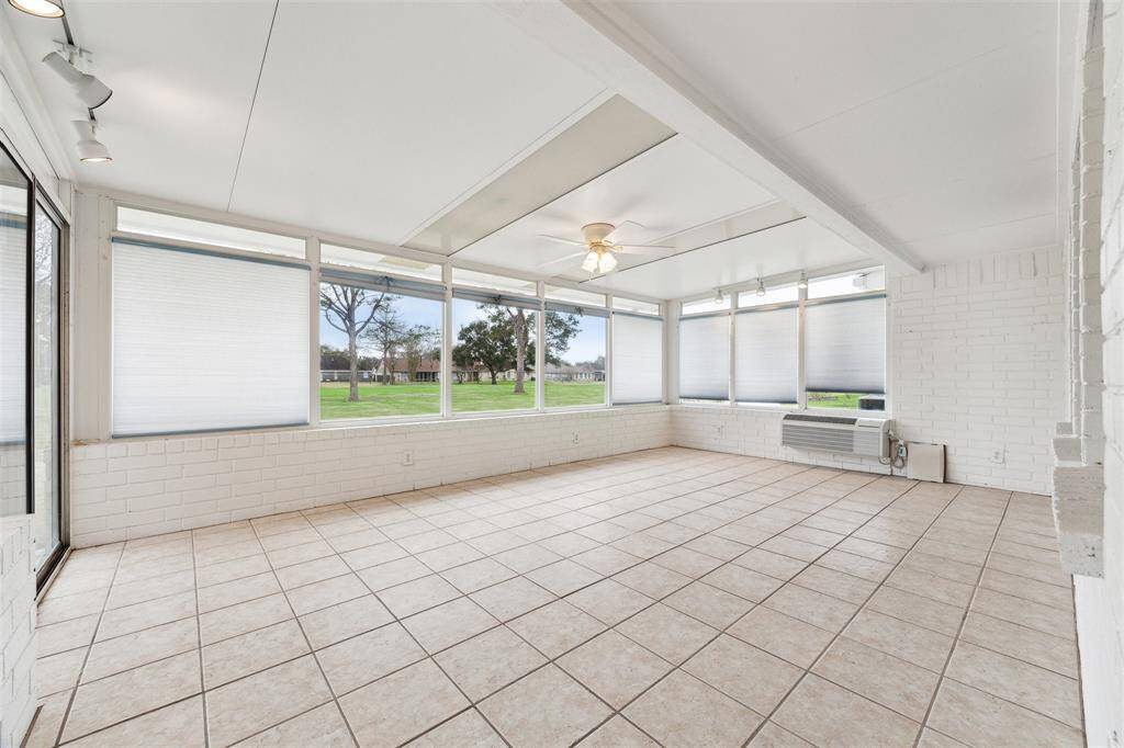 This climate controlled sunroom will be great with any weather and it has a view of the golf course.