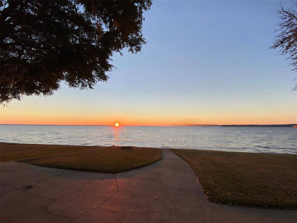 Wake up early, you must watch the magical moment of the sunrise. *Digitally altered to show what it would look like without the boathouse.