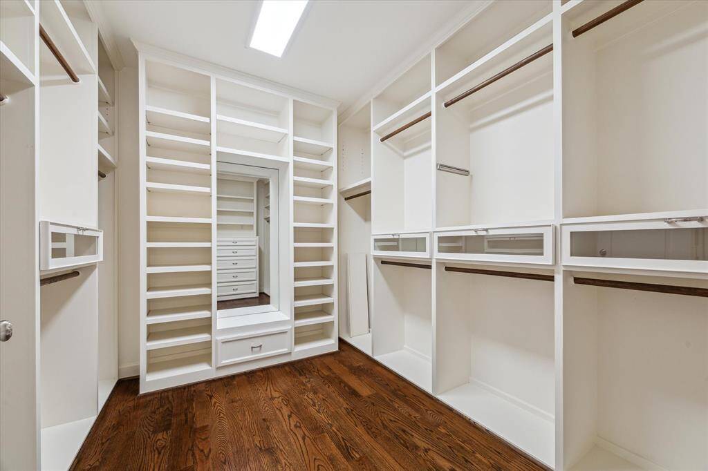 One of two primary suite closets.