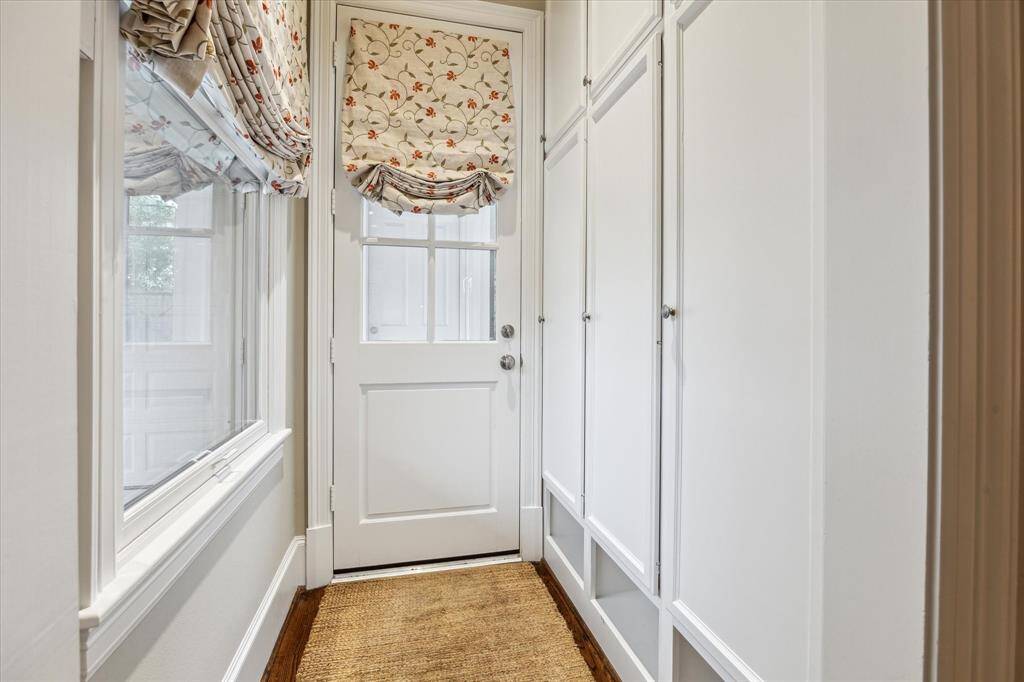 Back door entryway with mud locker storage.