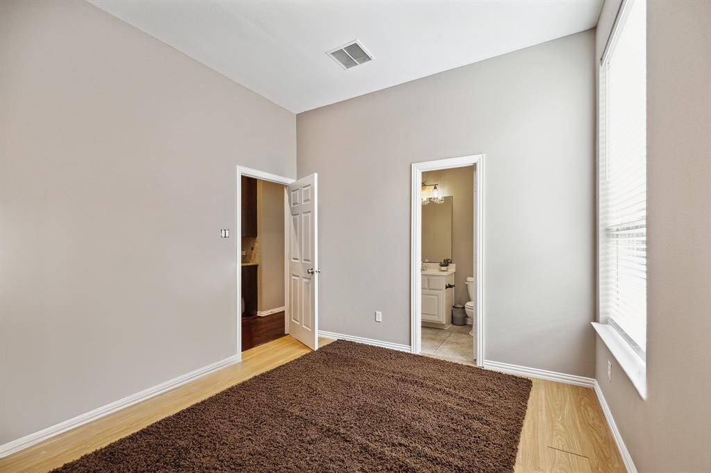 Secondary Bedroom or Guest Suite first floor with ensuite bathroom.