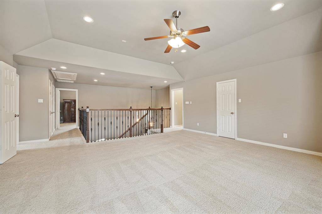 A large Game Room at the top of the stairs.
