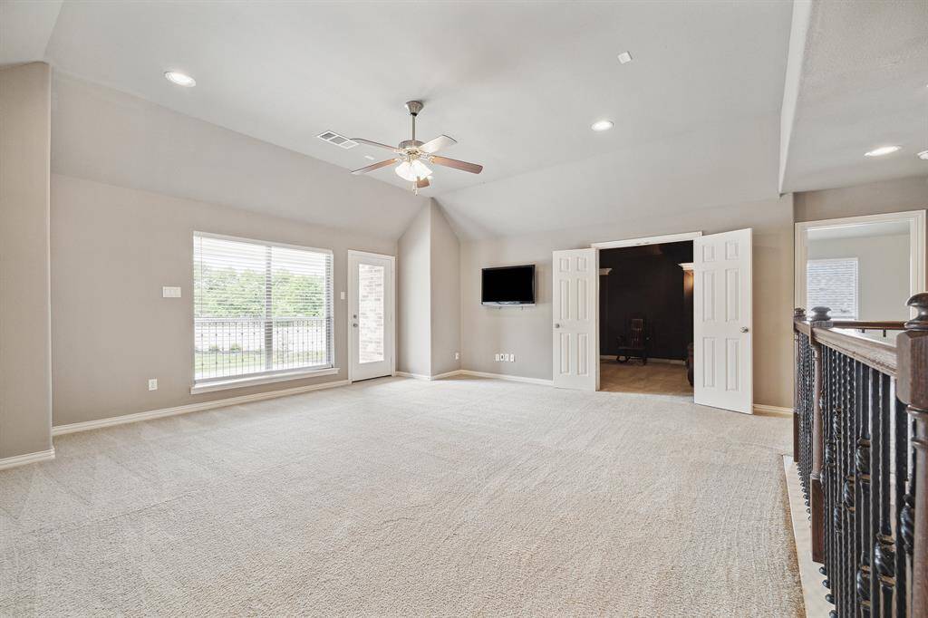Large Media Room off the Game Room through double doors.