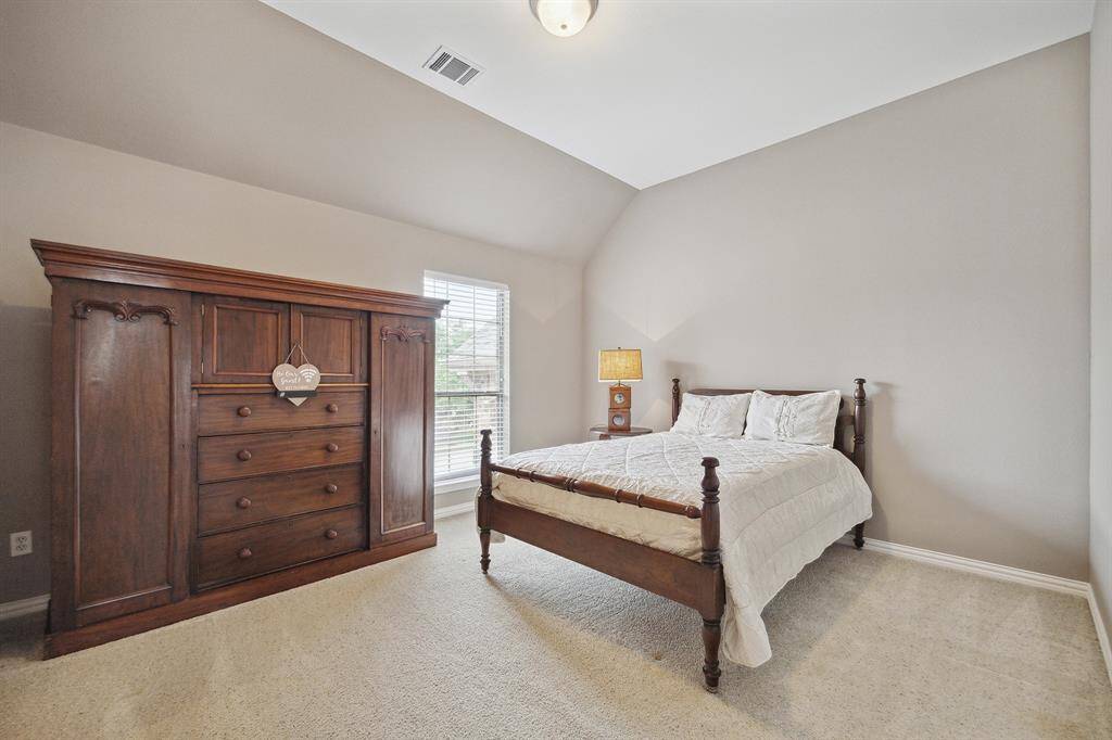 Another secondary bedroom upstairs.