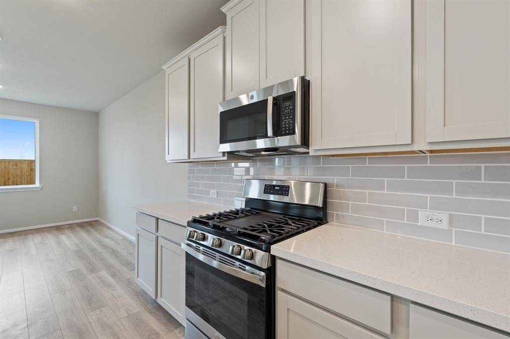 This kitchen is not only a functional space but also has ample storage. Whether you're a seasoned chef or just love to gather and enjoy good food, this kitchen is a dream come true.