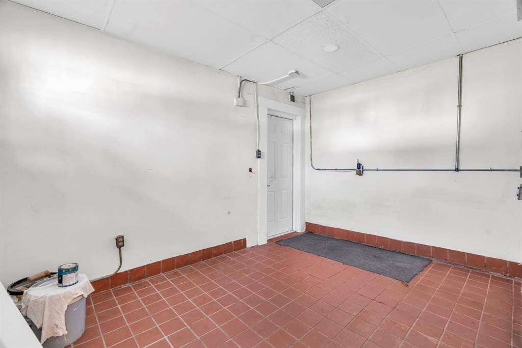 Formerly a restaurant kitchen in the rear of the west downstairs unit