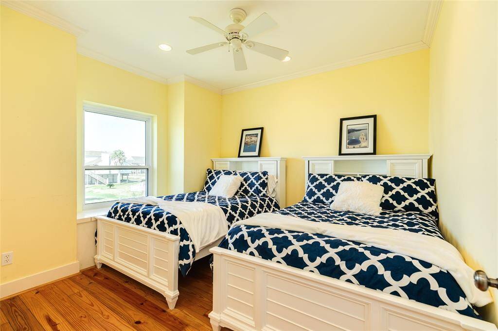 Main level bedroom with 2 queen beds.