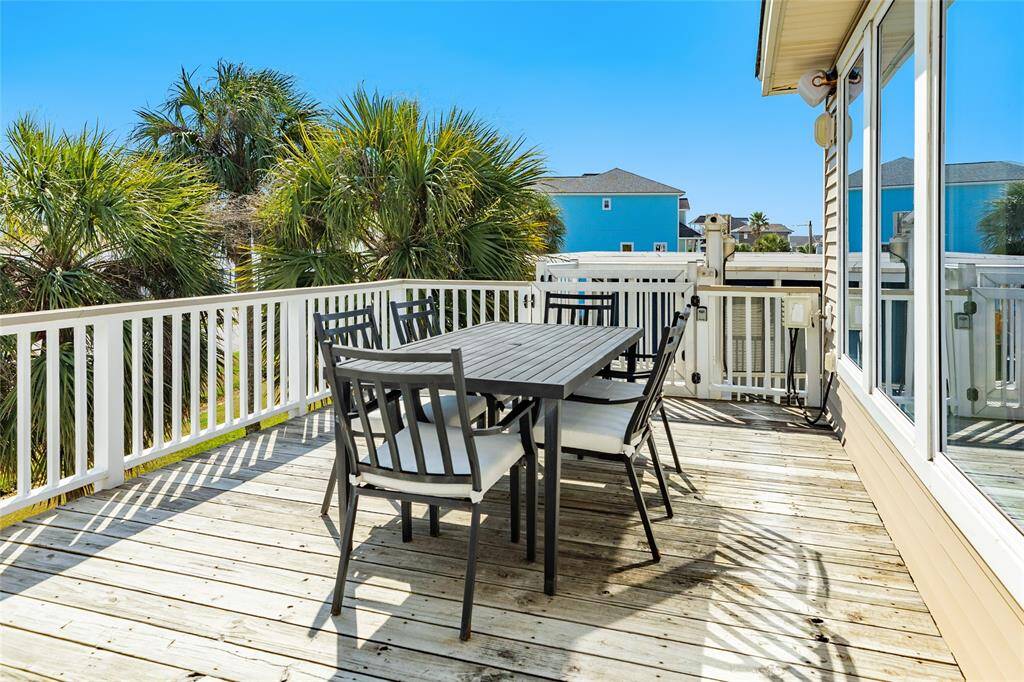 Great deck for enjoying evening dinners, morning coffee or lounging in the sun.  Umbrella in the garage for additional shade.