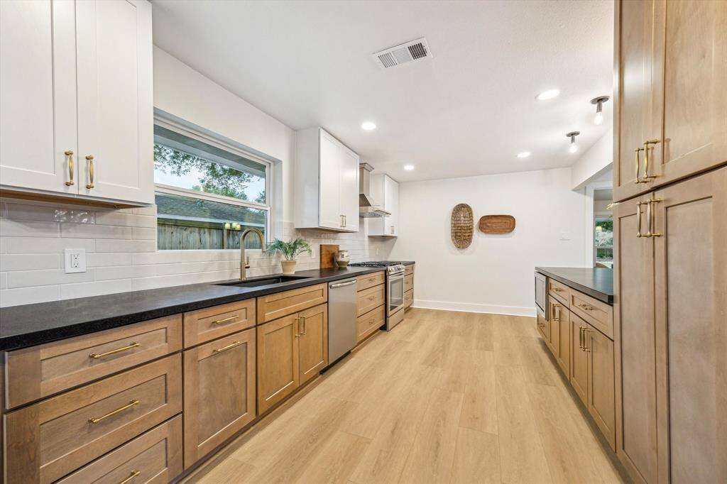 Rich kitchen details and lots of counterspace. You'll love creating here!