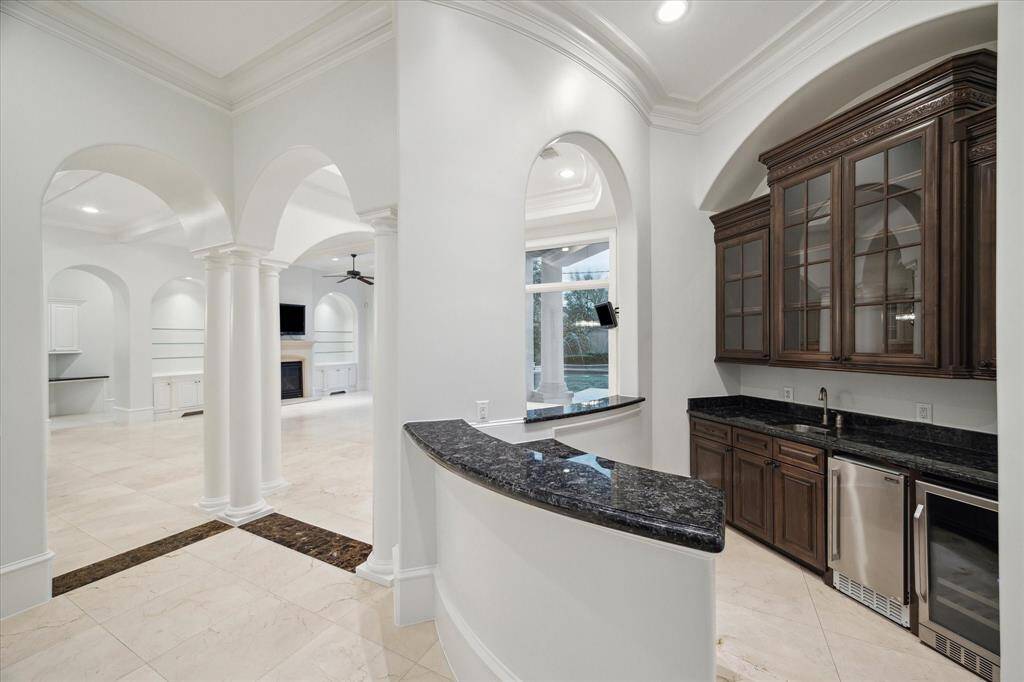 Wet bar with sink, ice maker and beverage fridge