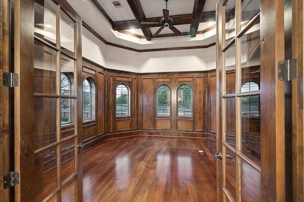 Second floor library/office with sophisticated wood panelling