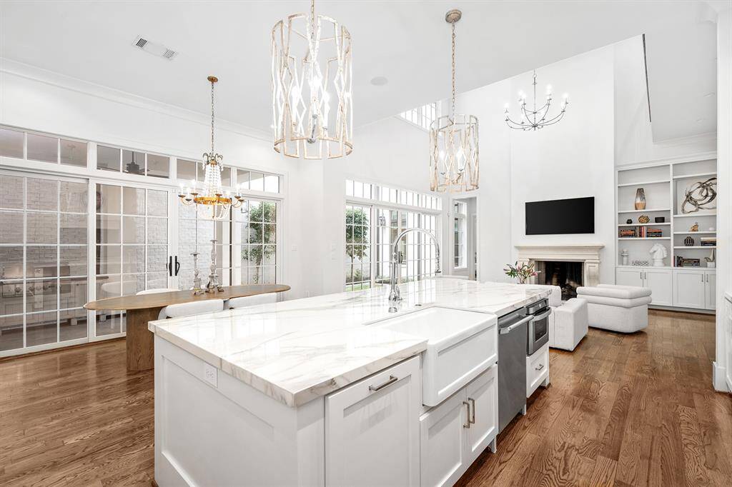 This home features exquisite custom details, neutral palette and abundant natural light.