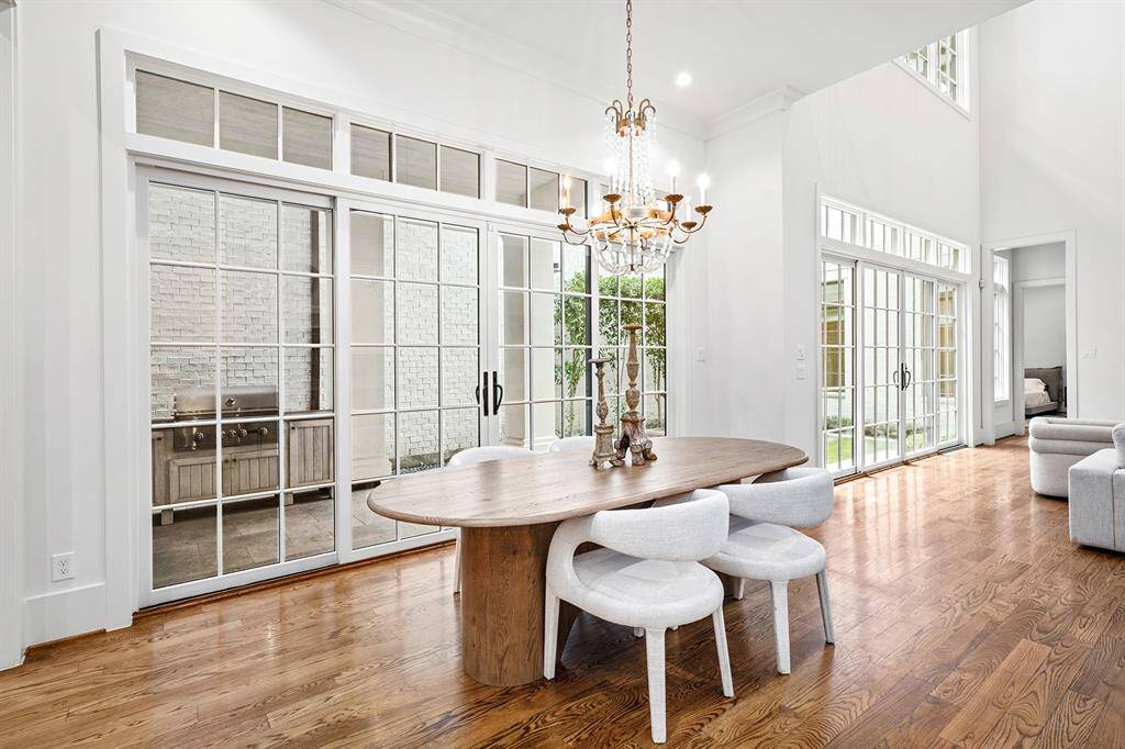 Alternate view of dining area, showing the seamless flow for a perfect indoor/outdoor living space & great for entertaining.