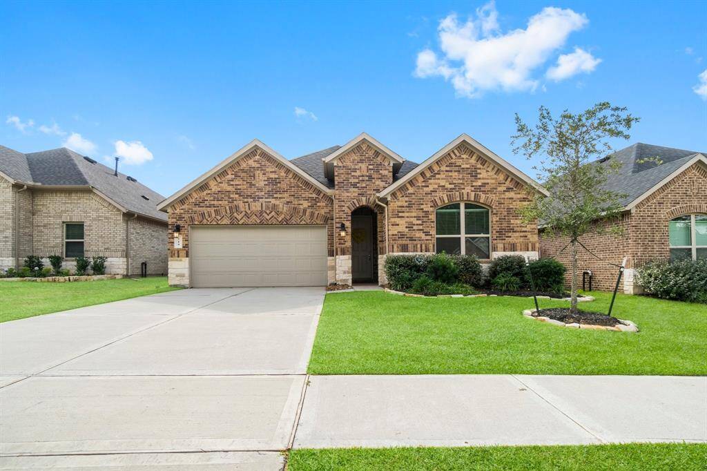 This one-story home, built in 2022 has a 3 car tandem garage.