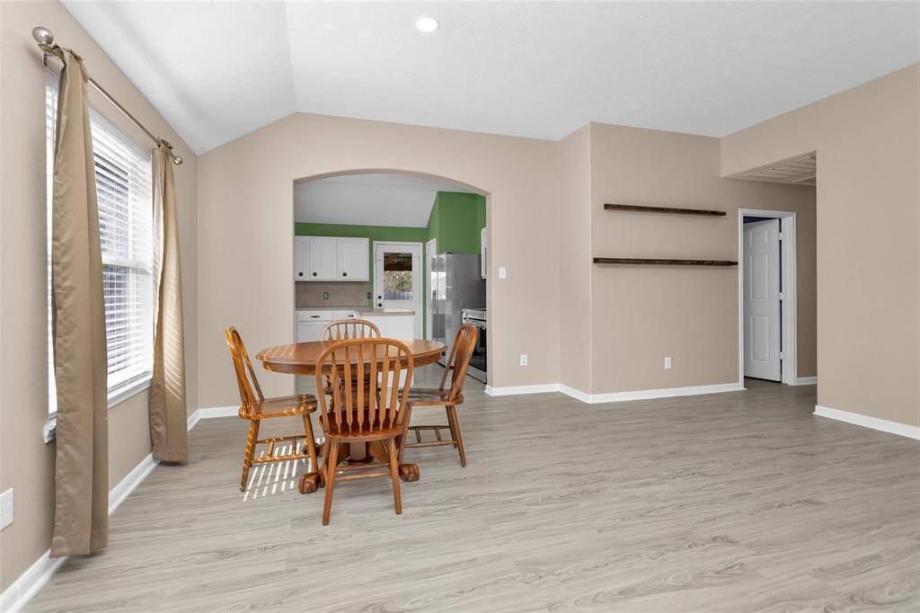 dining area between living area and kitchen
