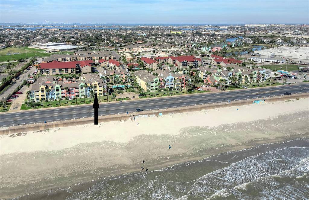 Aerial view of the property with the balcony of the condo marked.