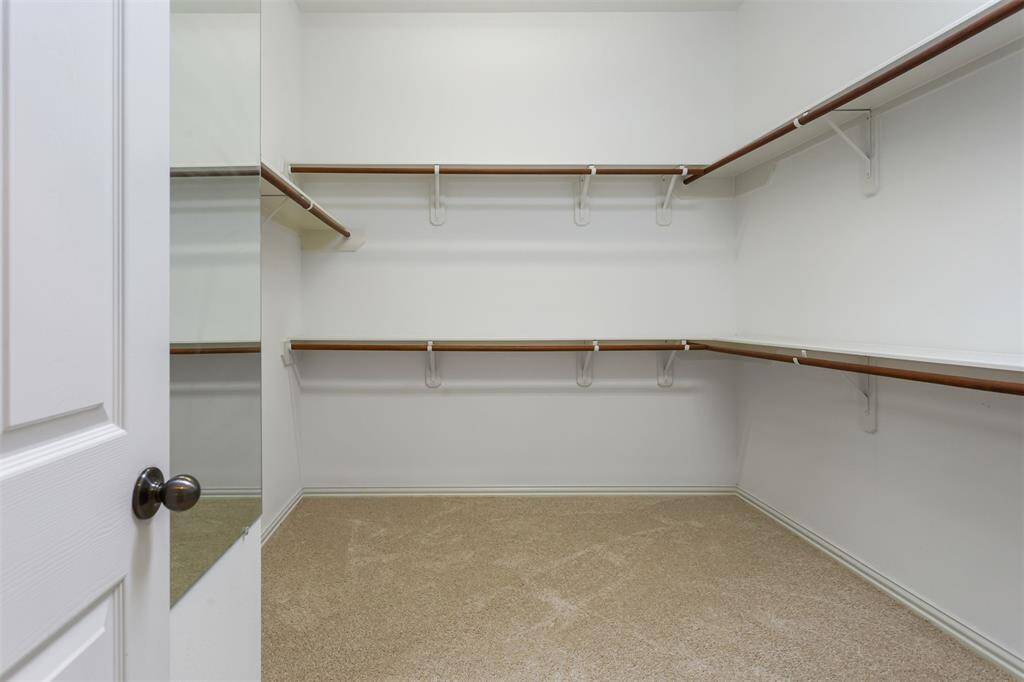 7014 Lake Haven Ct, Sugar Land Tx 77479-Primary bedroom closet.