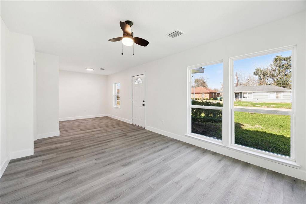 Photo is a view without staging. Plenty of space for you and your family. Laminate flooring throughout the home.