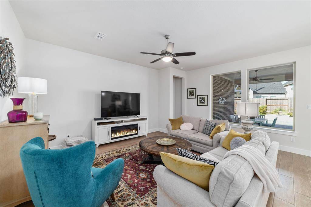 Fan and recessed lighting adds extra light n your already open living area