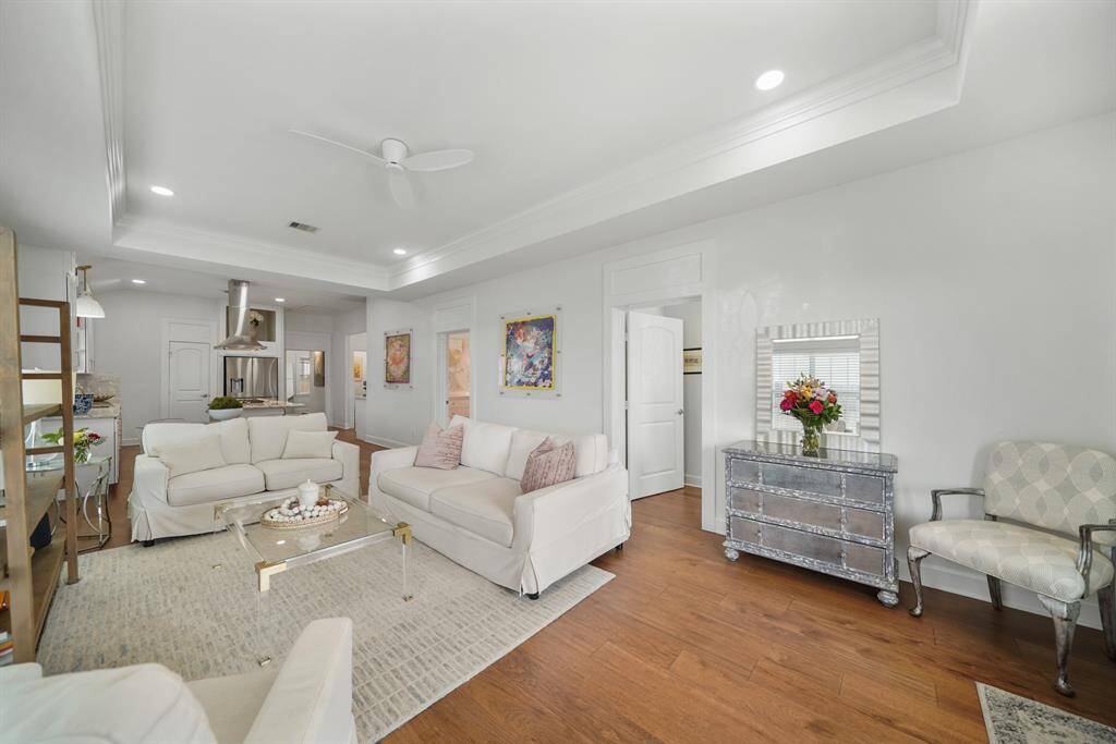 The space between the two windows is perfect for an entertainment center!