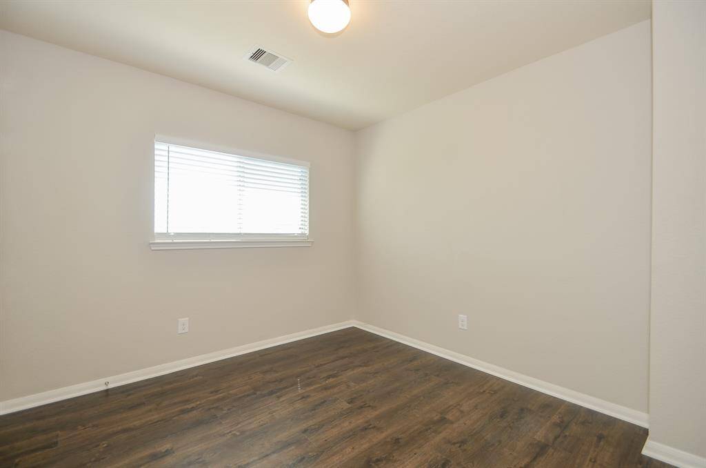 Bedroom 2 is 10"x10" can comfortably fit a a full sizebed and side table.